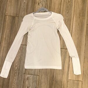Swiftly Tech Long-Sleeve Shirt 2.0
Hip Length
